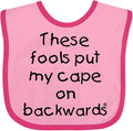 inktastic These Fools Put My Cape on Backwards Baby Bib by Inktastic