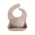 mushie Silicone Baby Bib | Adjustable Fit Waterproof Bibs by mushie