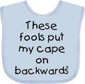 inktastic These Fools Put My Cape on Backwards Baby Bib by Inktastic