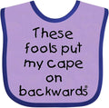 inktastic These Fools Put My Cape on Backwards Baby Bib by Inktastic