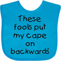 inktastic These Fools Put My Cape on Backwards Baby Bib by Inktastic