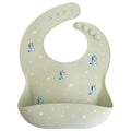 mushie x Bluey Silicone Baby Bib | Adjustable Fit Waterproof Bibs by mushie