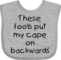 inktastic These Fools Put My Cape on Backwards Baby Bib by Inktastic