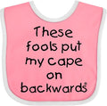 inktastic These Fools Put My Cape on Backwards Baby Bib by Inktastic