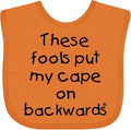inktastic These Fools Put My Cape on Backwards Baby Bib by Inktastic