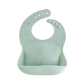 mushie Silicone Baby Bib | Adjustable Fit Waterproof Bibs by mushie