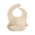 mushie Silicone Baby Bib | Adjustable Fit Waterproof Bibs by mushie