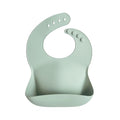 mushie Silicone Baby Bib | Adjustable Fit Waterproof Bibs by mushie