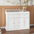 Nursery Dresser with Changing Table Top, Laundry Basket & Raised Guard by ROMSHINE