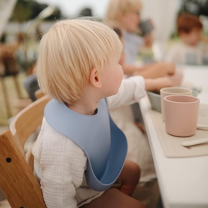 mushie Silicone Baby Bib | Adjustable Fit Waterproof Bibs - Image 4