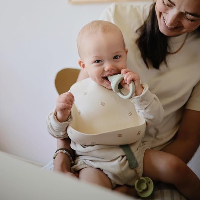 mushie Silicone Baby Bib | Adjustable Fit Waterproof Bibs - Image 4